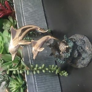 Brass Dolphins and Small Turtle Perch on Coral.